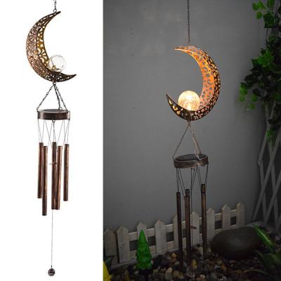 China Outdoor Solar Powered Eid Ramadan Garden LED Moon Crackle Wind Chime Mobile Hanging Solar Lights for sale