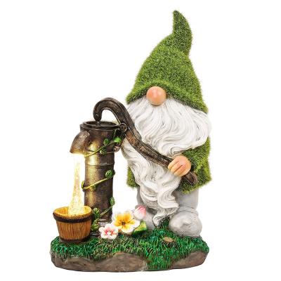 China Africa Outdoor Garden Assembled Resin Gnome Statue Solar Funny Gnome Statues With Solar LED Lights for sale