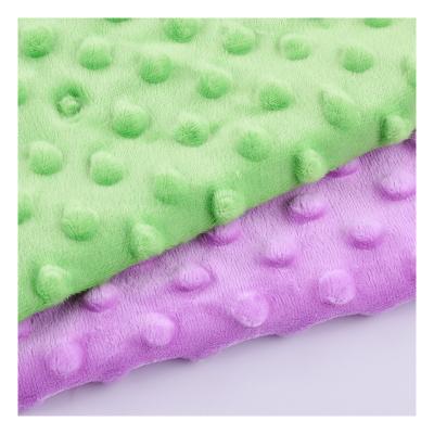 China Soft Embossed Bubble Minky Dot Plush Blanket Fabric Breathable Baby Cuddle Blanket Fabric Poly Dot Embossed Fabric for sale