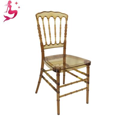 China Plastic Resin Napoleon Stackable Stackable Brown Yellow Transparent Acrylic Chairs For Wedding Event for sale