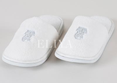 China Premium Cotton Hotel White Velour Disposable Hotel Slippers Closed Toe With EVA Sole for sale