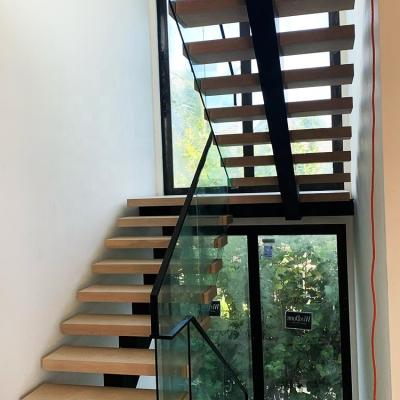 China Floating Wooden Staircase Kit Smart Tread Stair Spine Staircase Design Modern Straight Center Steel Attic Staircase Indoor for sale