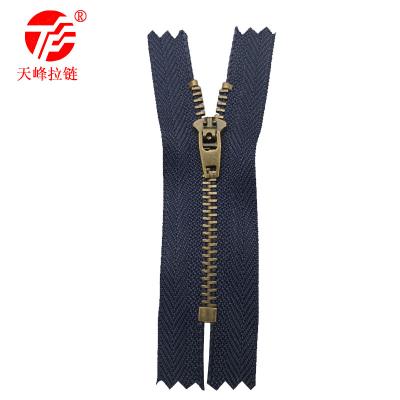 China Auto Lock Jeans Zipper Brass Narrow Zipper Heavy Duty Anti Open Anthracnose Customizable In Any Size Pants Access YG Spring Head for sale