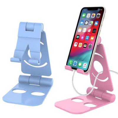 China Factory direct sale adjustable foldable mobile phone stand, universal lazy bracket for phone and laptop cellphone stands for sale