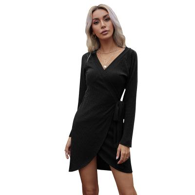 China Autumn Sexy Loose Solid Anti-wrinkle V-Neck Knitted Pullover Long Sleeve Woman Sweater Dress for sale