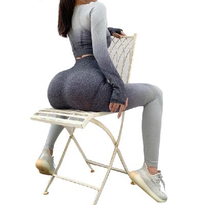 China New breathable high waist hip lifting nude seamless women's yoga pants gradually dry tight variable speed sports running fitness pants for sale