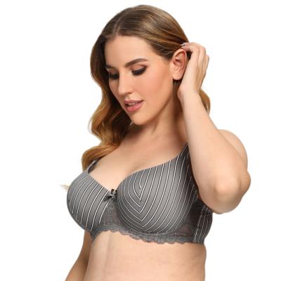 China 2021 new one-piece decompression wide shoulder strap underwear with steel ring gathered bra women's large size smooth striped bra for sale