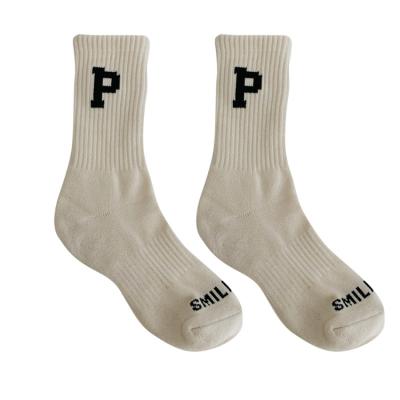 China New hot sale QUICK DRY terry bottom threaded letter socks women slouch socks ladies cotton leopard socks for sale