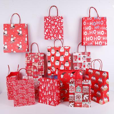 China Gift & Craft Mixed Colors Packaging And Stocking Bags Latest Design Christmas Decoration Supplies Paper Gift Bags for sale