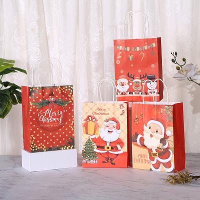 China Gift & Craft Ready to Ship Cheap Package Santa Christmas Gift Bags Wholesale Price Kraft Paper Bags For Sale for sale