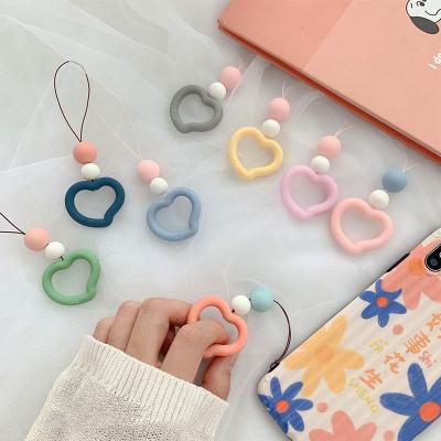 China 2022 Fashion Rubber Hot Custom Ins Silicone/PVC Silicone Rubber PVC Flowers Heart Low Price Mobile Phone Accessories Flexible Holder For Women for sale