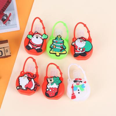 China Promotional Wholesale Kid Safe Silicone Cartoon Hand Sanitizer Bottle Holder Cover Merry Christmas Gifts For Kids Custom Logo for sale