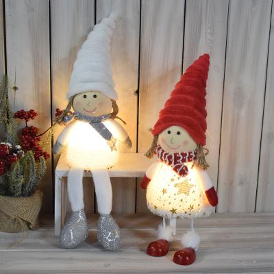 China Newest 2022 Polyester Christmas Light Up Ornaments Holiday Natal Decor Lovely Plush White Animated Christmas Dolls With LED Light for sale