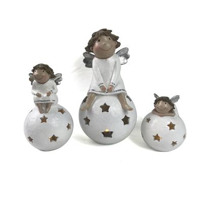 China Europe 2021 New European Craft Resin Statue Navidad Christmas Figurines Ornaments Beauty Resin Angel With LED Light for sale