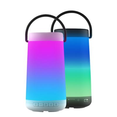 China Custom Logo Wireless Portable BT Speaker Colorful Led Lightweight Speaker With One Handle for sale