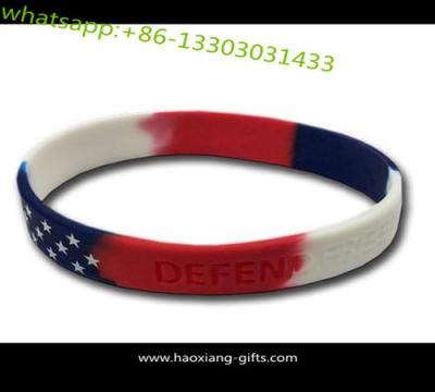 China Promotion customized design embossed or debossed logo silicone wristband for sale