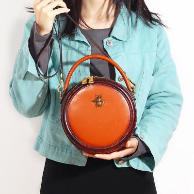 China 100% Eco-Friendly On Sales Whip A Bag Women's Retro Small Circle Shoulder Messenger Bee Design Handbag Women Bag for sale