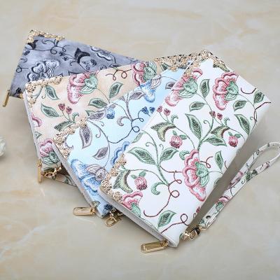 China Flower Embroidery Zipper Style Anti-theft Purses For Girls Fashion Designer Ladies Long Wallets Wrist Bag for sale