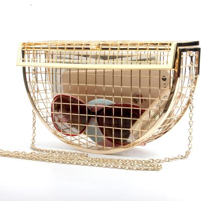 China 100% 2021 Outlet Eco-friendly Hollow Women Shoulder Bag Luxury Cross - Body Evening Clutch Bag Metal Cage Half Moon Wedding Party Handbag Clutch for sale