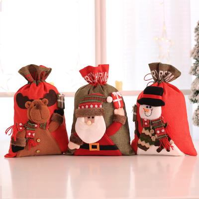 China Hot Sale ChristmasLarge 3D Cartoon Decoration Christmas Gift Bag For Christmas Drawstring Candy Bag For Home for sale