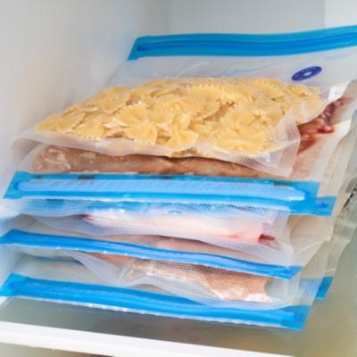 China Custom Transparent Moisture Proof Vacuum Sealer Bag Roll To Food Packaging Seal Package Storage Plastic Bag for sale