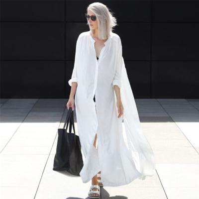 China Bl002 Breathable Beach White Blouse For Holiday Female Style Fashion Elegant Women Loose V Neckline Solid Split Dresses for sale