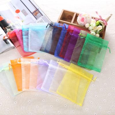 China Wholesale Pure Colored Custom Logo Drawstring Pouch Transparent Organza Eco - Friendly Small Bags for sale