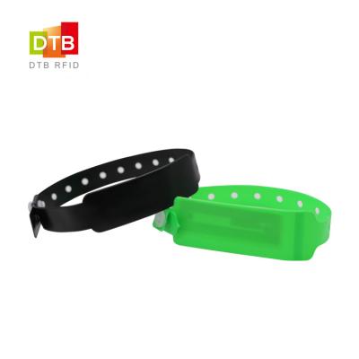 China Customized Waterproof/Waterproof PVC NFC Wristband C 13.56Mhz RFID Chip Double Layer High Frequency Vinyl MIFARE Smart Wristband For Event for sale