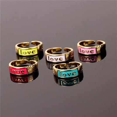 China Hyperbole Love Letter Ring Red Drop Oil Wedding Engagement Ring English Element Copper Opening Fit Ring for sale