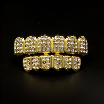 China Alloy Unisex Gold Plated Teeth Grillz Hip Hop Iced-Out Grillz Teeth For Body Accessories for sale