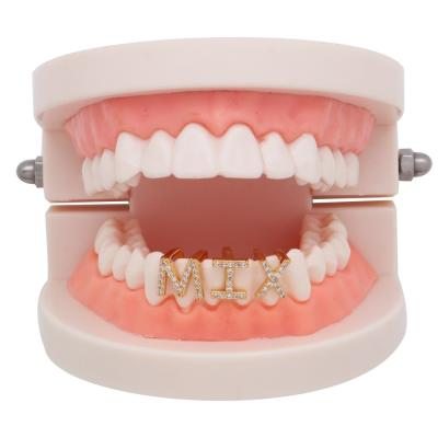 China Hiphop 26 English Uppercase Hip Hop Braces with Diamond Metal Denture Jewelry for sale