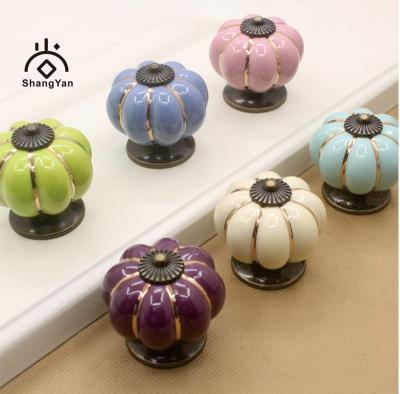 China New Quality Llectrostatic Prevention Vintage Rugged Furniture Pumpkin Ceramic Door Pull Handles Knobs for sale