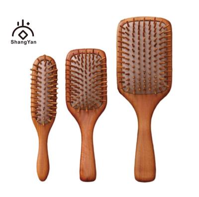 China 2022 Natural Anti-Static Peach Jujube Travel Cushion Detangling Wooden Teeth Bubble Cushion Hair Scalp Massager Brush Comb for sale