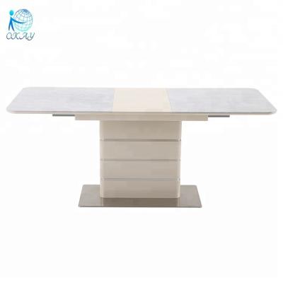 China Modern High Gloss Extendable Stainless Steel MDF Dining Table for sale