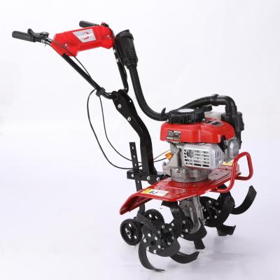 China Potente motor diesel/gasolina de mano empujar la gasolina rotativo cultivador para el hogar en venta