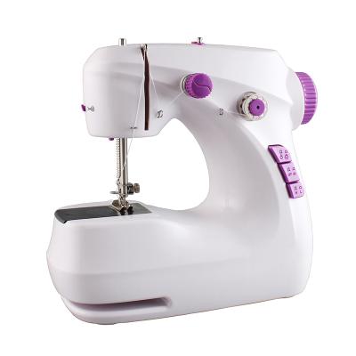 China Protect Children With Newest Low MOQ Safe Wholesale Portable Mini Electric Household Guard Sewing Machine With Table Customized Color for sale