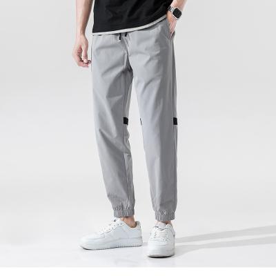 China Anti-wrinkle anti-pilling popular mid waist sport sweatpants for men with pockets for sale