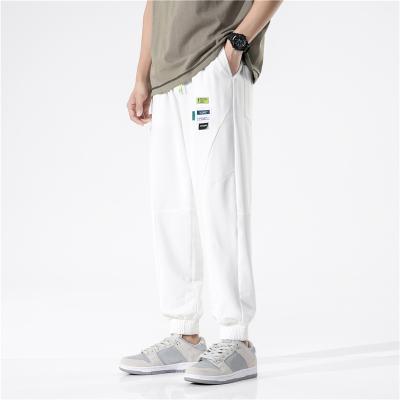 China Anti-wrinkle Over Waist Wholesale Men Elastic Waist Closure Cotton Stacked Joggers Sweatpants With Side Pockets for sale