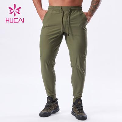 China Custom Slim Fit Plain Sports Skinny Polyester Men's Logo Gym Breathable Joggers for sale