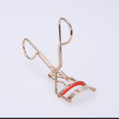 China Makeup Tools New Design Professional Carbon Steel Eyelash Curler With Gold Plated for sale