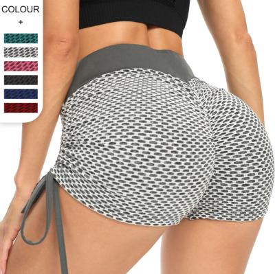 China Anti-Static Women Butt Shaping Hot Yoga Shorts Jacquard Drawstring Gym Weave Shorts High Stretch Sports Short Tights for sale