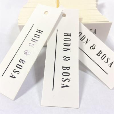 China Cheap Custom black foil Logo Die Cut Hang Tag Hang tags For Clothing hang tag for sale