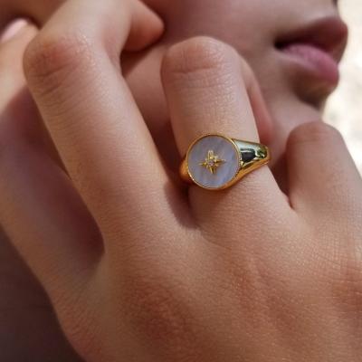 China Tasty Minimal Vintage Statement Ring Star Signet Ring Stainless Steel 18k Gold Plated North Star Pearlescent CZ Ring For Her for sale