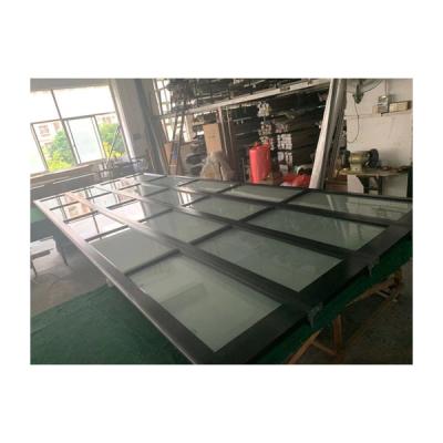 China Sectional Garage Door Aluminum Alloy Windproof Double Glass Panel With Insulation for sale