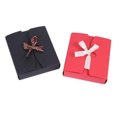 China Recycled Materials Recycled Kraft Paper Boxes Candy Food Biscuit Folding Packing Boxes With Ribbon for sale