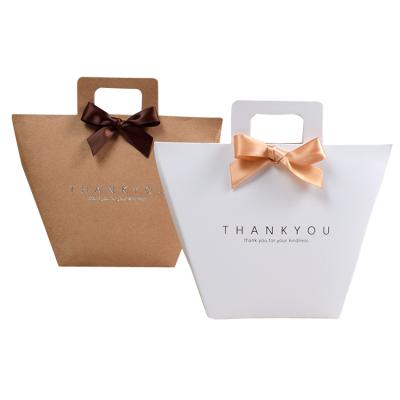 China Recycled Materials Hot Sale Goods Using High Quality Gift Bags Paper Customized Kraft Paper Bags for sale