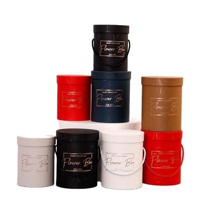 China Recyclable Custom Cylinder Packaging Boxes Round Paper Hat Flower Gift Box With Lid Birthdays Weddings for sale