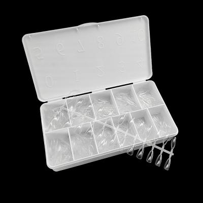 China Eco-Friendly ABS Glitter Latest Design Box Of 550 Tablets Short Almond Nail Tips Full Coverage Allow Free Fake Nails Coffin Press On Nail for sale