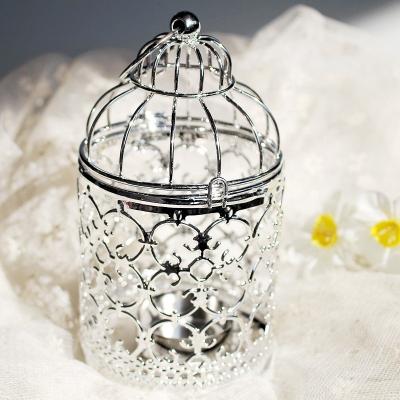 China Weddings Metal Candle Holder Centerpiece Decorative Hollow Out Birdcage Iron Candlestick Hanging Lantern for sale