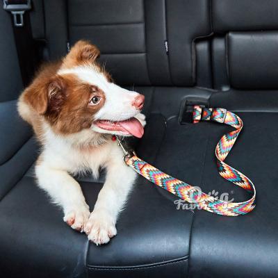 China Custom Adjustable Retractable Spot Dog Pet Seat Belt Fashion Print Retractable Pet Car Seat Belt Hot Product for sale